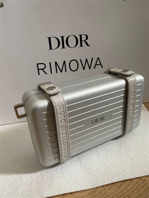 rimowa x dior clutch|Dior clutch with hand strap.